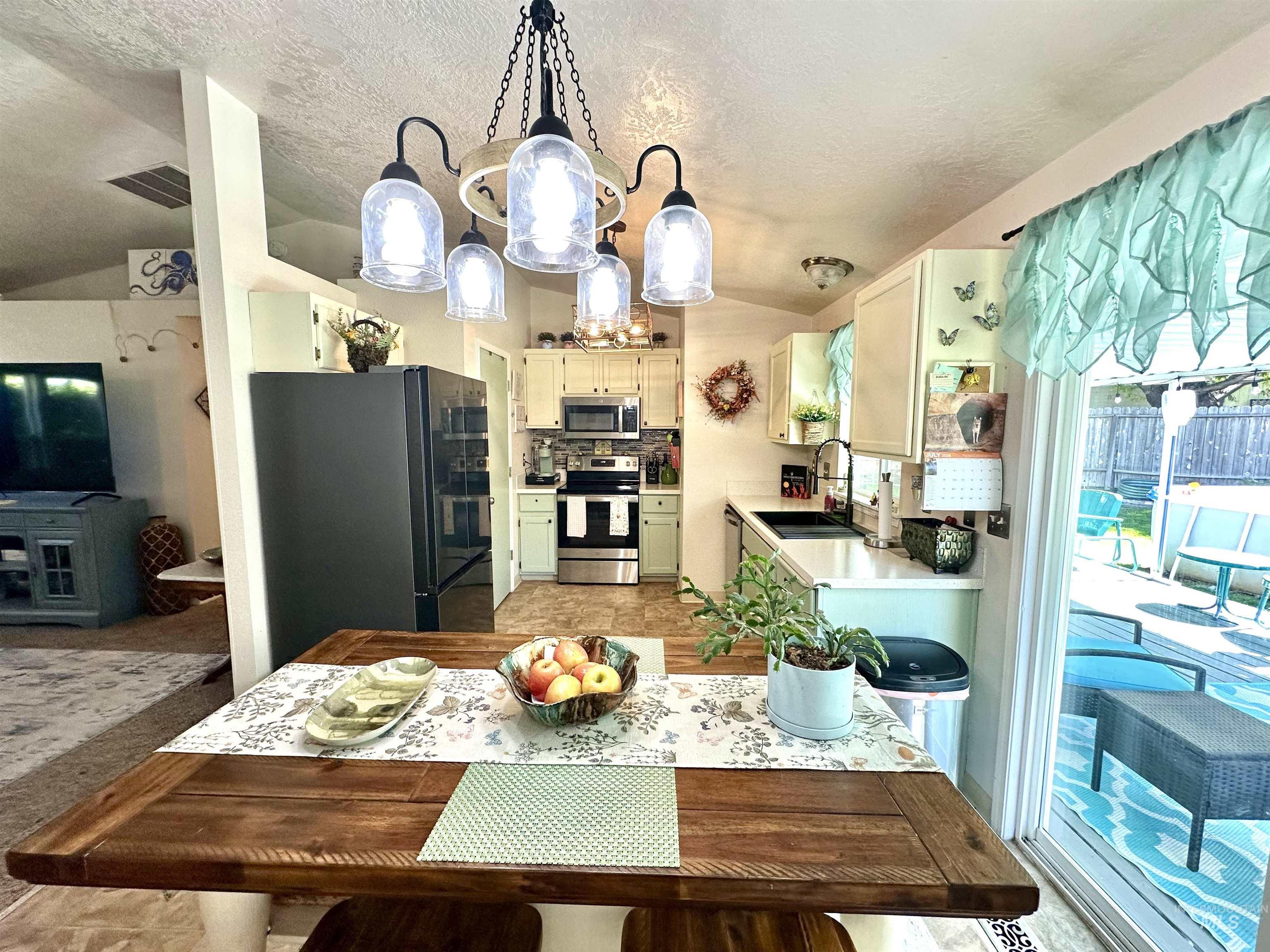 2472 North Maxie Way Meridian, ID 83646 - Photo 10 of 23 Open-concept kitchen and dining area