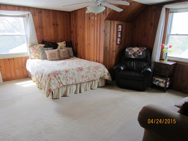2249 Downey Road Homewood, IL 60430 - Photo 3 of 6 a bedroom with a bed and a window