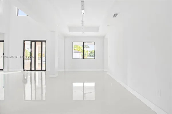 an empty room with windows