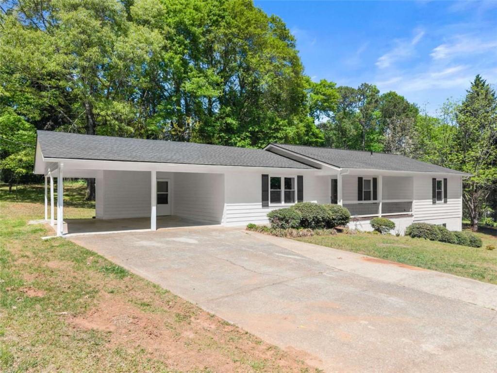 front view of a house with a yard