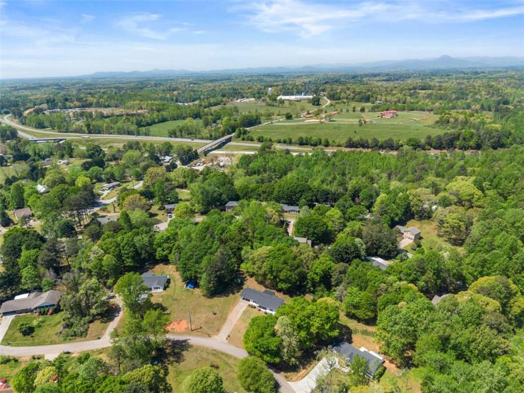 217 Quail Trail Cornelia, GA 30531 - Photo 17 of 48 an aerial view of a city with lots of residential buildings