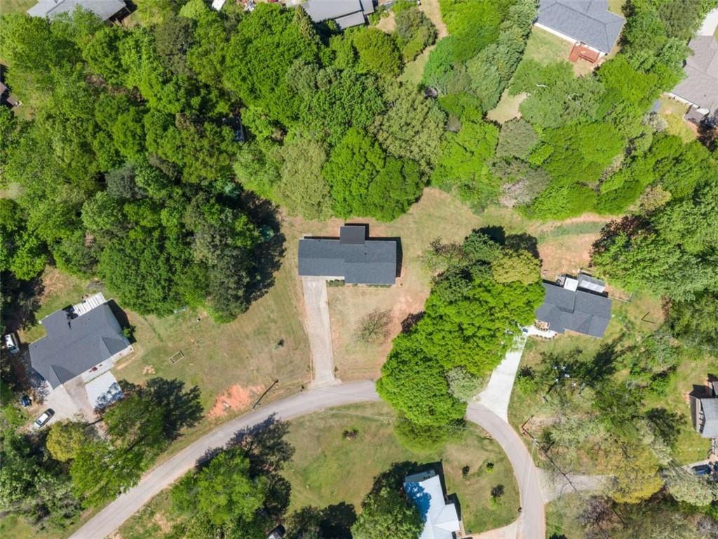 217 Quail Trail Cornelia, GA 30531 - Photo 24 of 48 an aerial view of a house with a yard