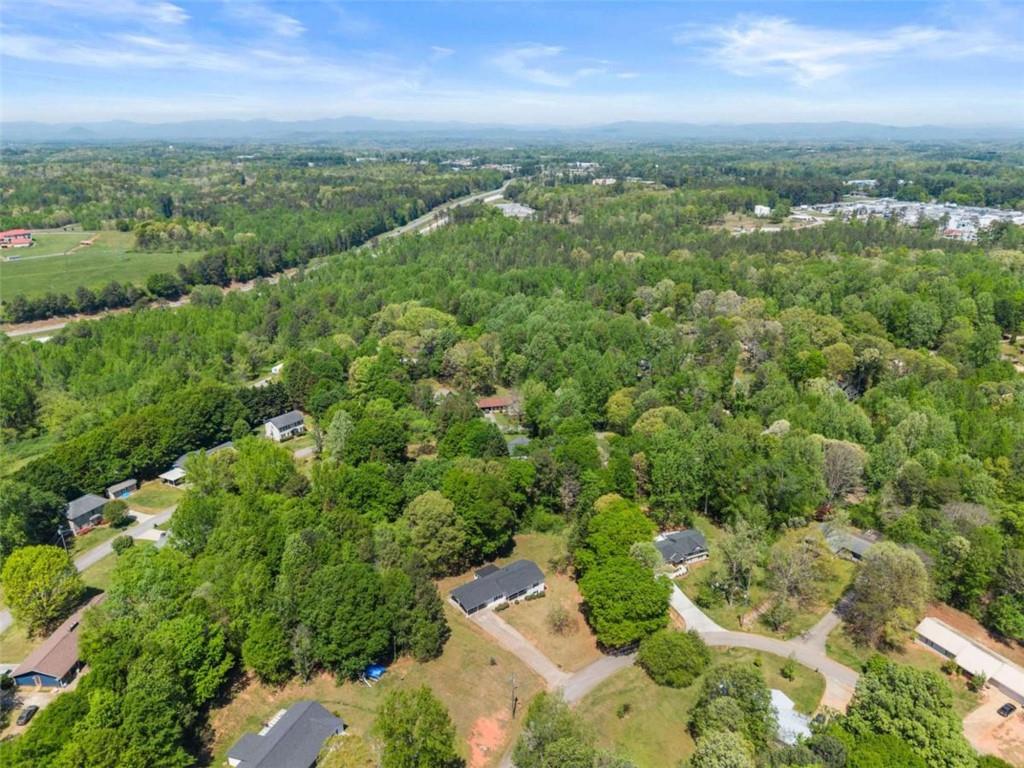217 Quail Trail Cornelia, GA 30531 - Photo 31 of 48 an aerial view of a city with lots of residential buildings