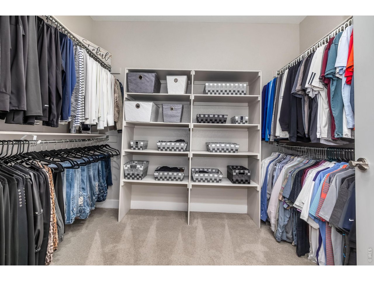 3789 Bridle Ridge Circle Severance, CO 80524 - Photo 28 of 44 a view of walk in closet with clothes and shoes
