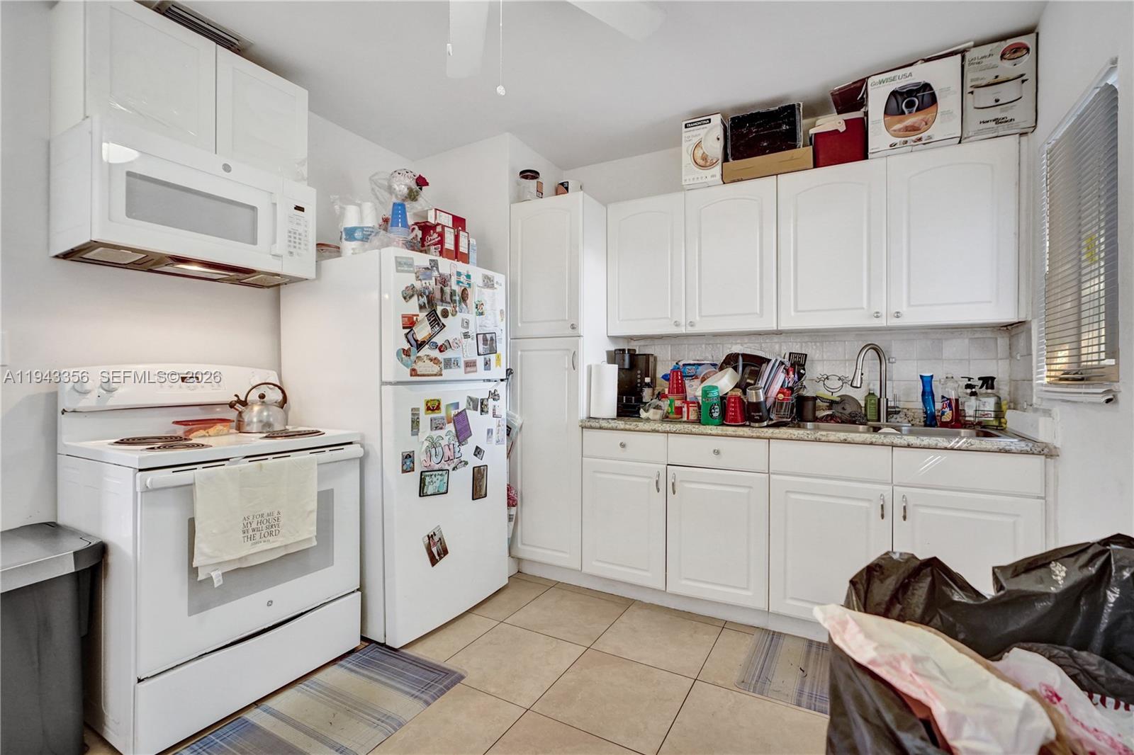 1748 Northwest 57th Street Miami, FL 33142 - Photo 8 of 31