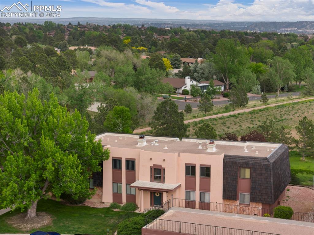 2949 Mesa Road, Unit C Colorado Springs, CO 80904 - Photo 28 of 28 an aerial view of residential houses with outdoor space and trees
