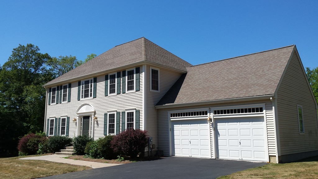 67 Arnold Road Sturbridge, MA 01518 - Photo 1 of 29 a front view of a house with a yard