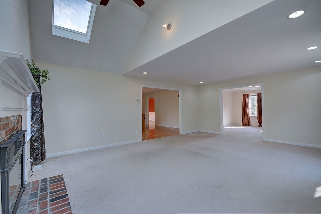 67 Arnold Road Sturbridge, MA 01518 - Photo 12 of 29 a view of empty room with window and fireplace