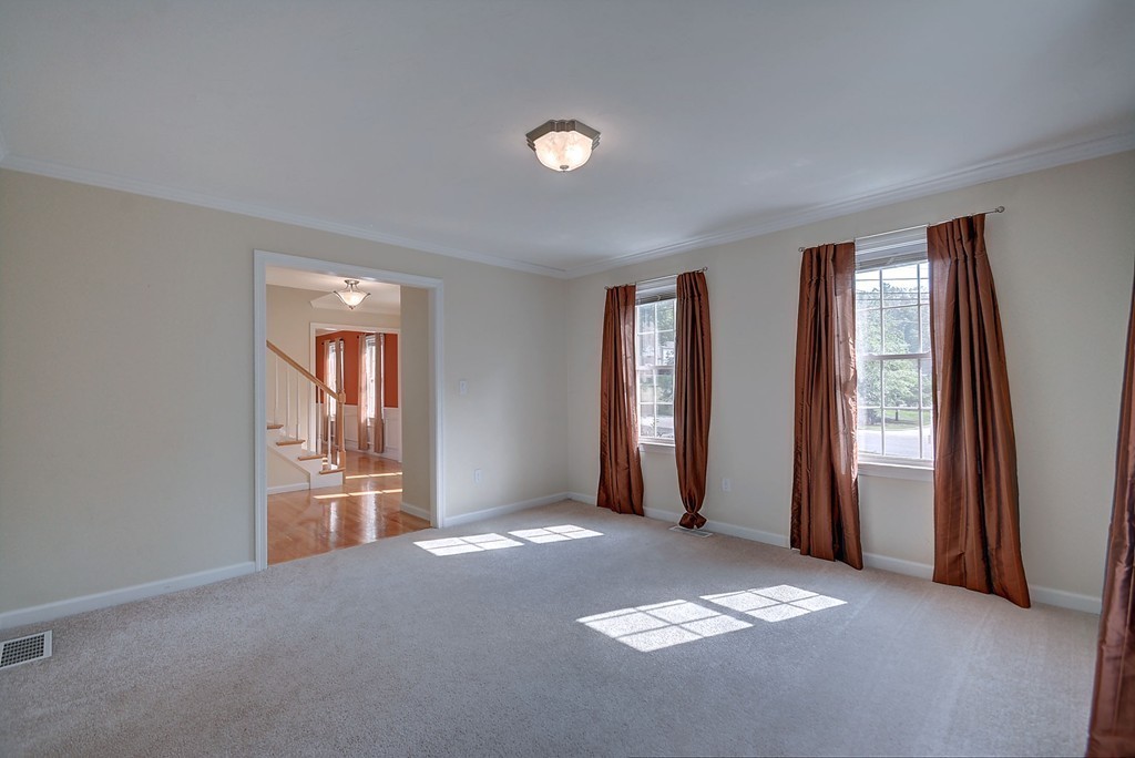 67 Arnold Road Sturbridge, MA 01518 - Photo 13 of 29 an empty room with windows and closet