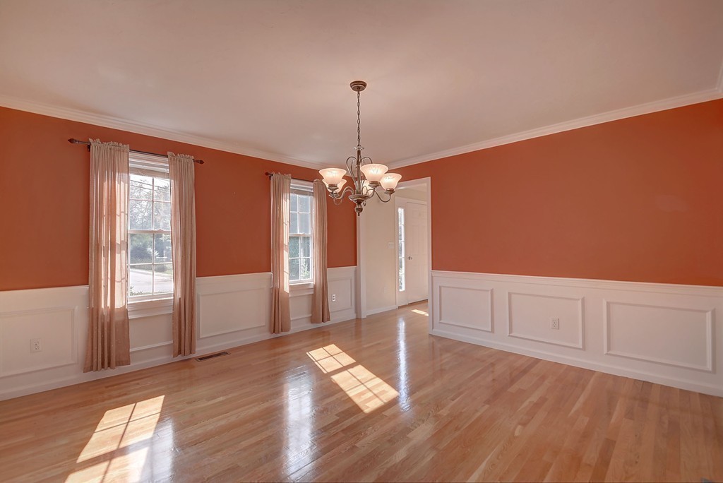 67 Arnold Road Sturbridge, MA 01518 - Photo 14 of 29 a view of an empty room with window and wooden floor