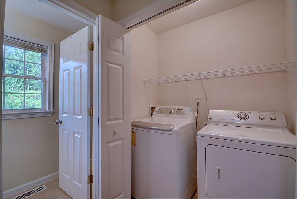 67 Arnold Road Sturbridge, MA 01518 - Photo 18 of 29 a utility room with dryer and washer
