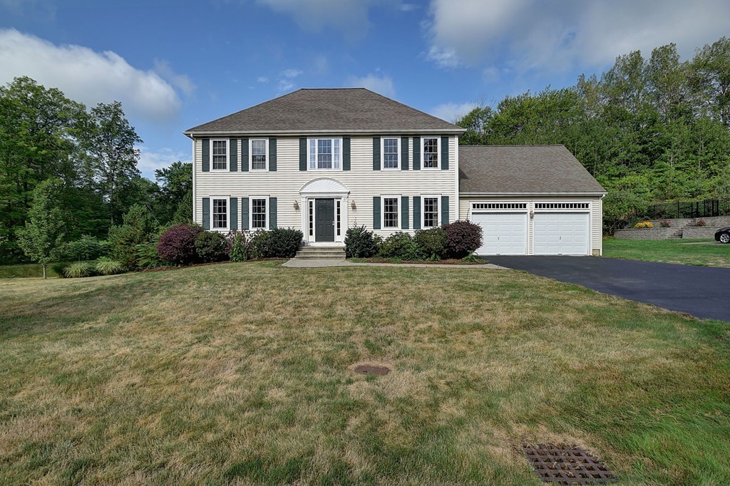67 Arnold Road Sturbridge, MA 01518 - Photo 26 of 29 a front view of a house with garden