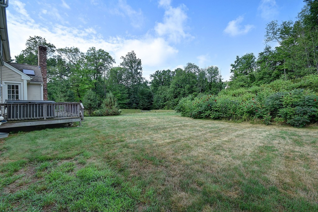 67 Arnold Road Sturbridge, MA 01518 - Photo 29 of 29 a view of a yard with wooden fence