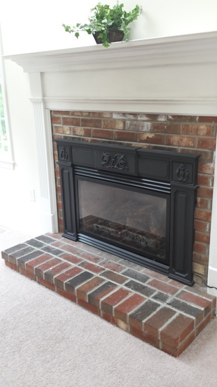 67 Arnold Road Sturbridge, MA 01518 - Photo 10 of 29 a view of fireplace and utility room