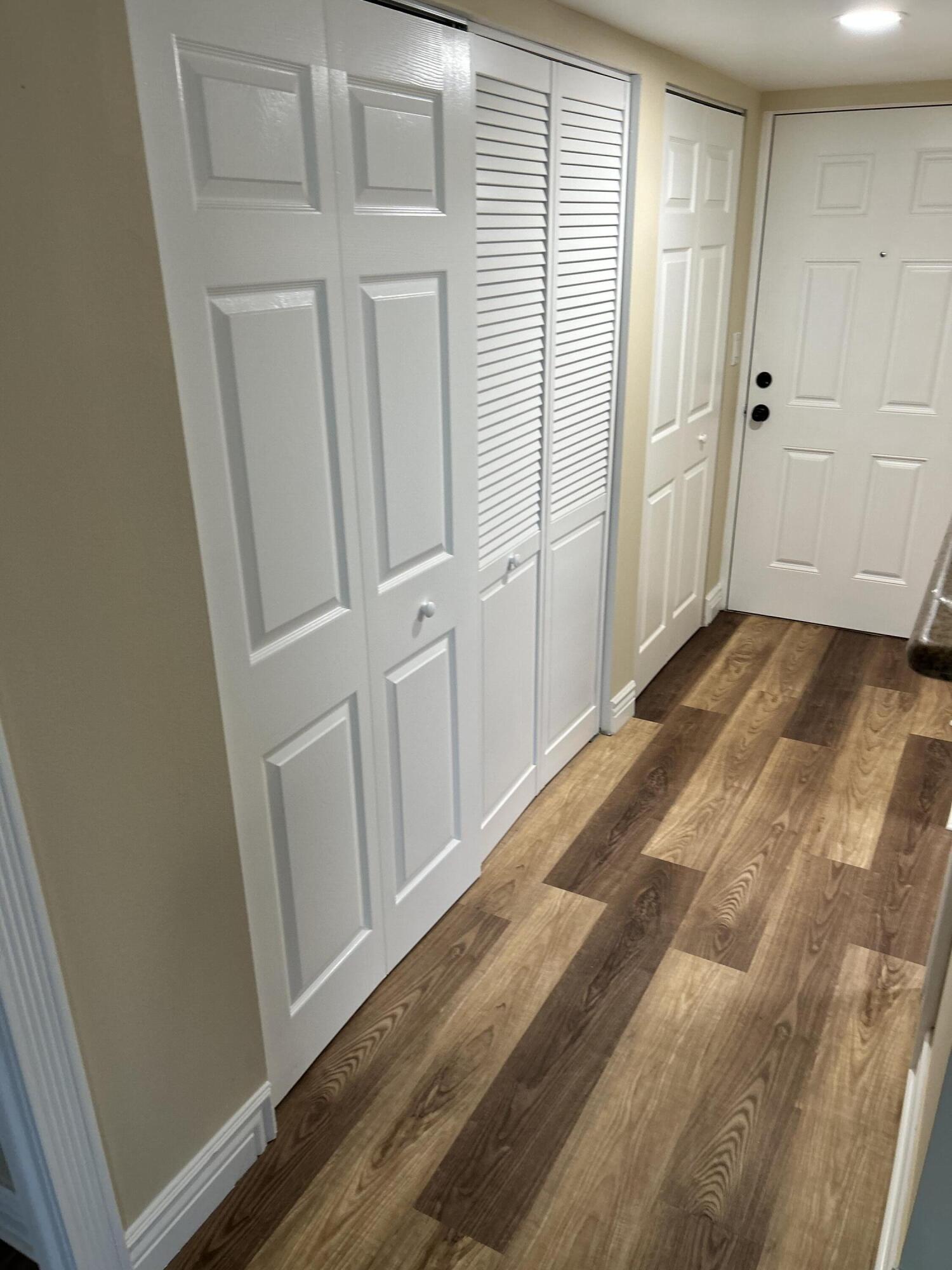 5201 Northwest 2nd Avenue, Unit 112 Boca Raton, FL 33487 - Photo 11 of 40 a view of a hallway with closet