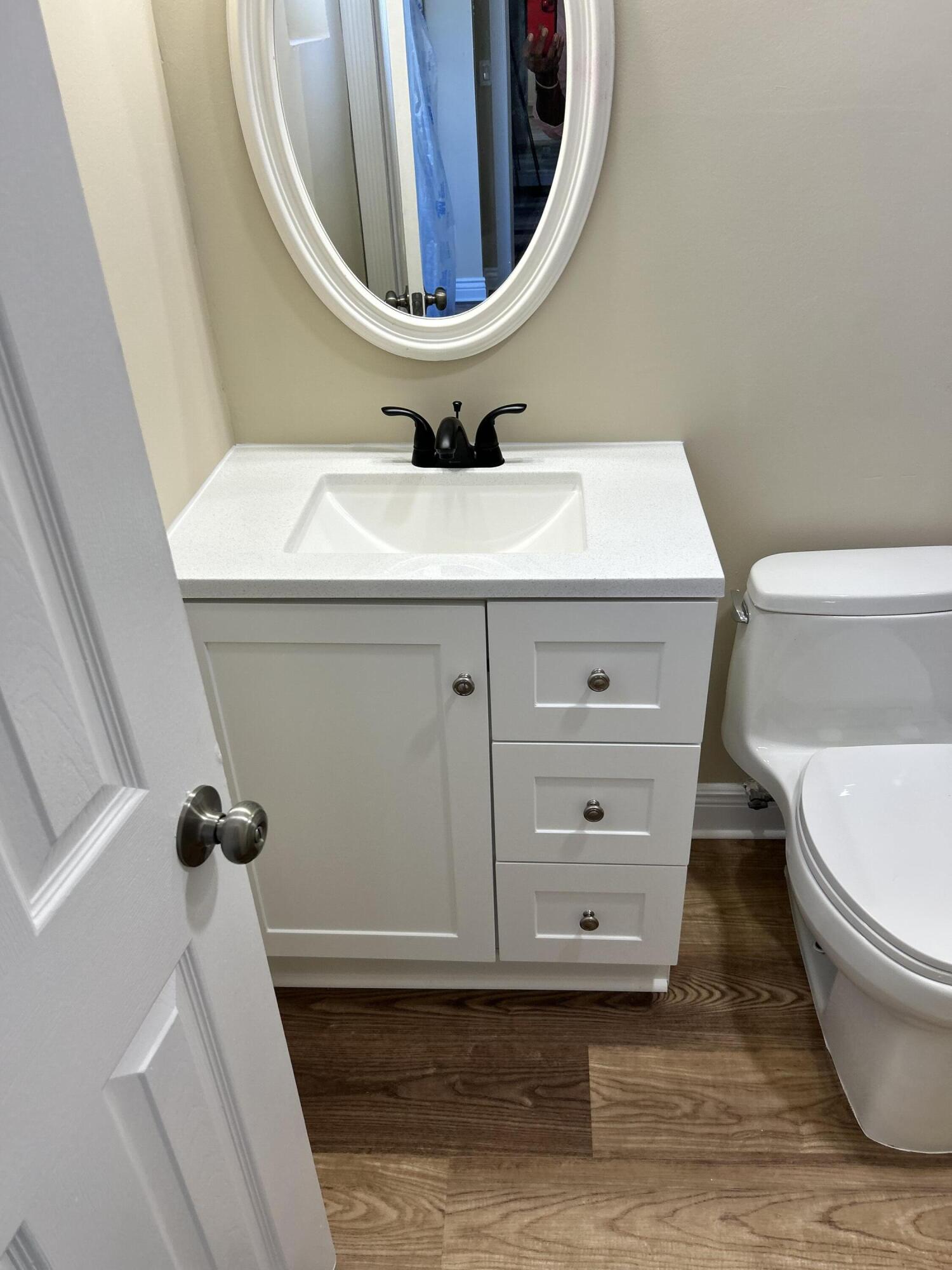 5201 Northwest 2nd Avenue, Unit 112 Boca Raton, FL 33487 - Photo 20 of 40 a bathroom with a sink and a mirror