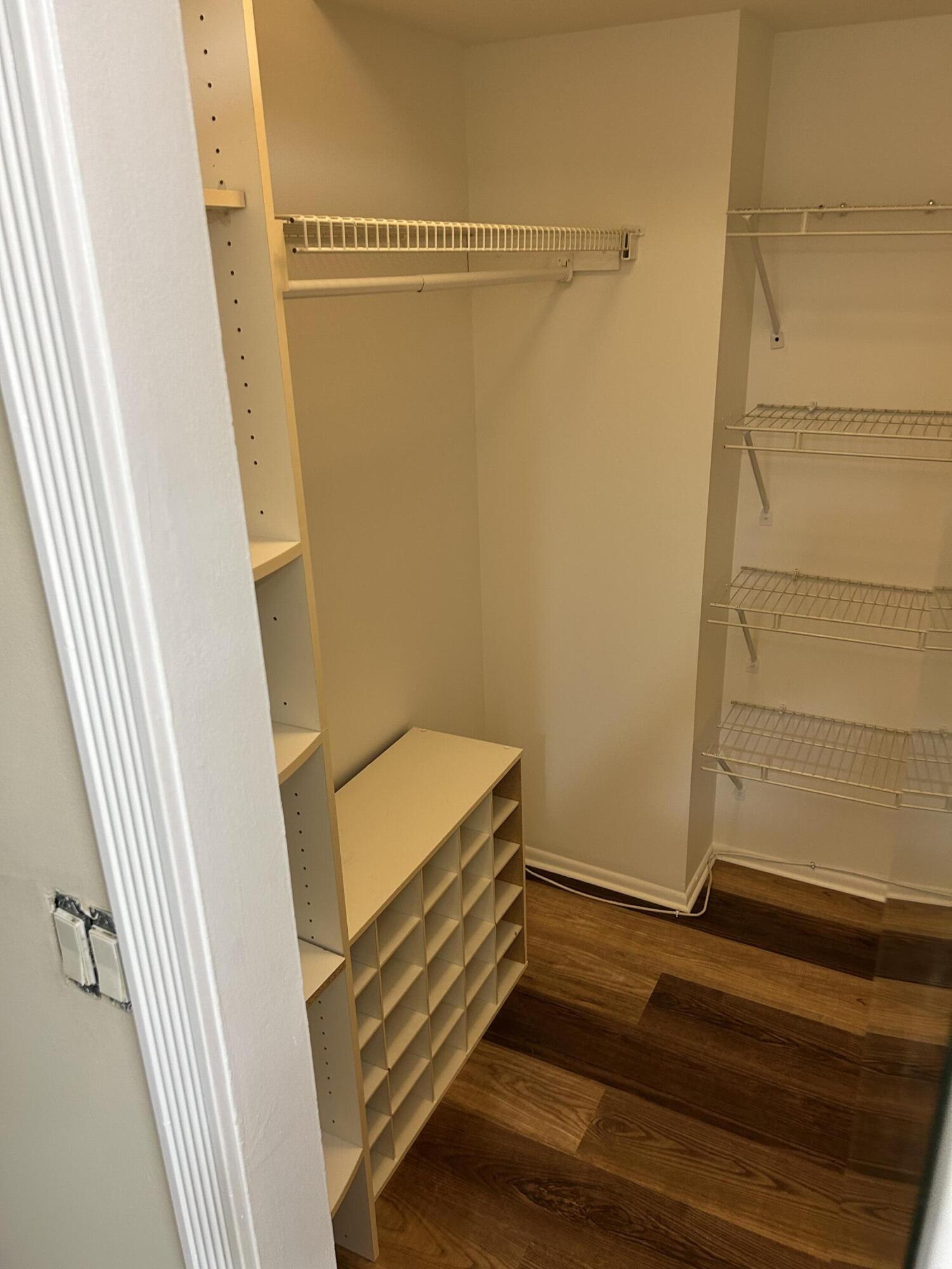 5201 Northwest 2nd Avenue, Unit 112 Boca Raton, FL 33487 - Photo 27 of 40 a view of a room with racks on the wall