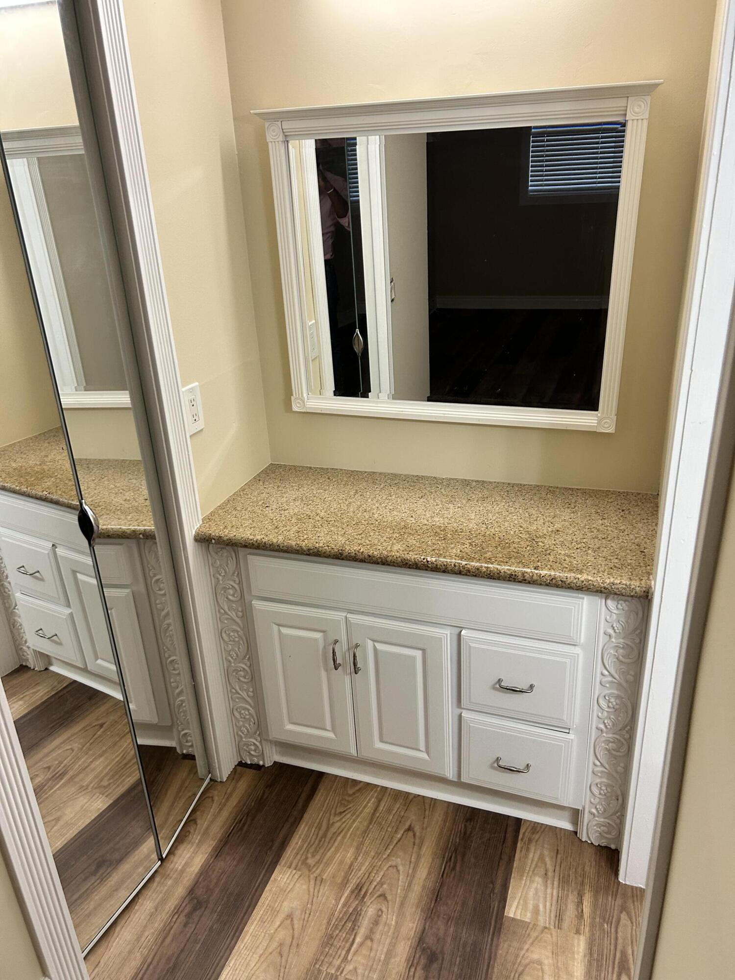 5201 Northwest 2nd Avenue, Unit 112 Boca Raton, FL 33487 - Photo 31 of 40 a bathroom with a sink and mirror