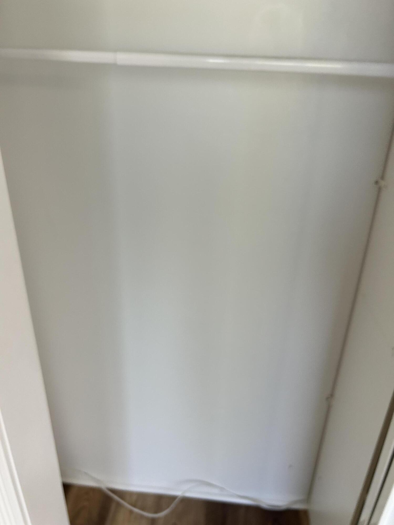 5201 Northwest 2nd Avenue, Unit 112 Boca Raton, FL 33487 - Photo 37 of 40 a view of a closet with wooden floor