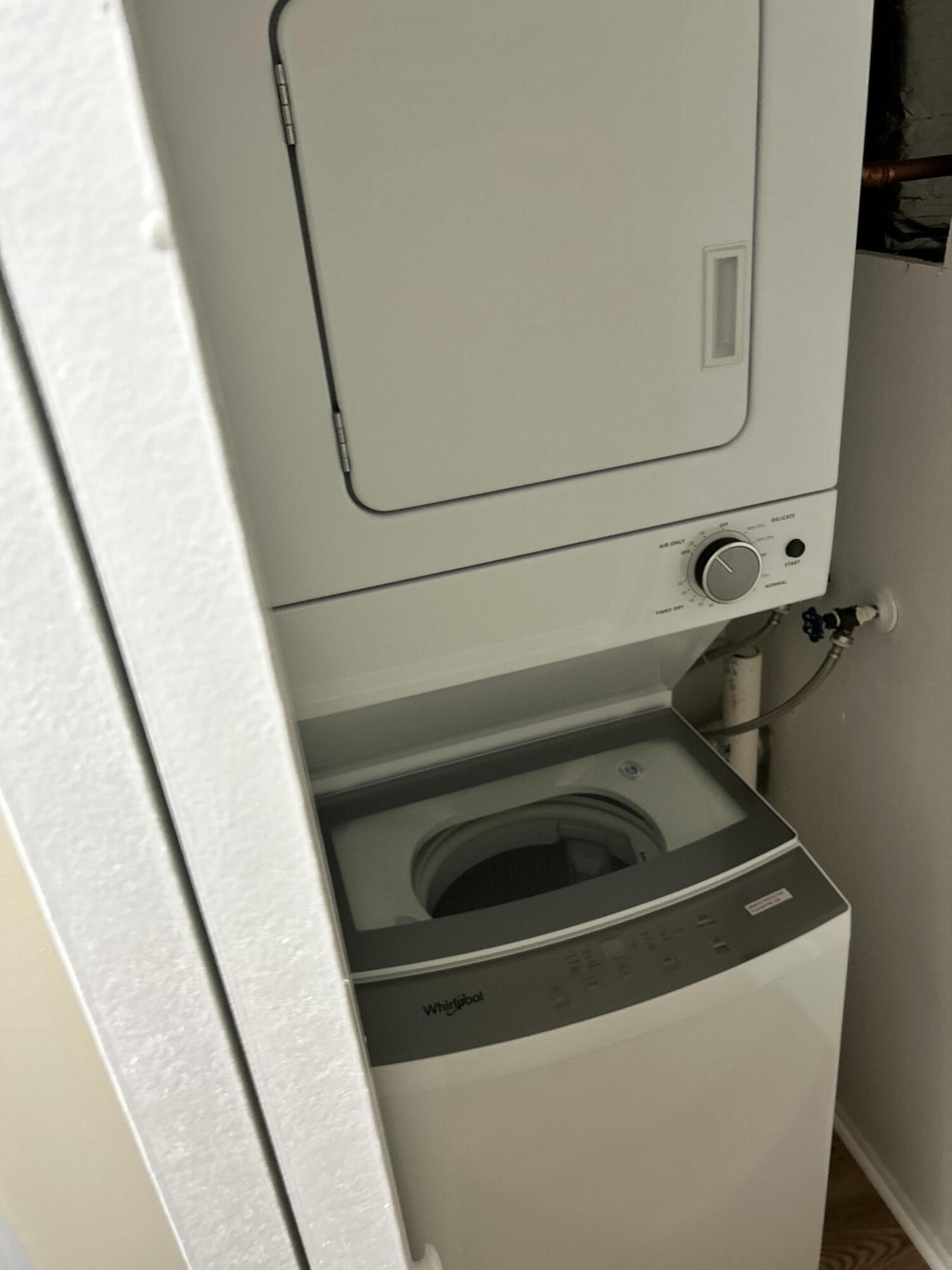 5201 Northwest 2nd Avenue, Unit 112 Boca Raton, FL 33487 - Photo 10 of 40 a close view of washer and dryer