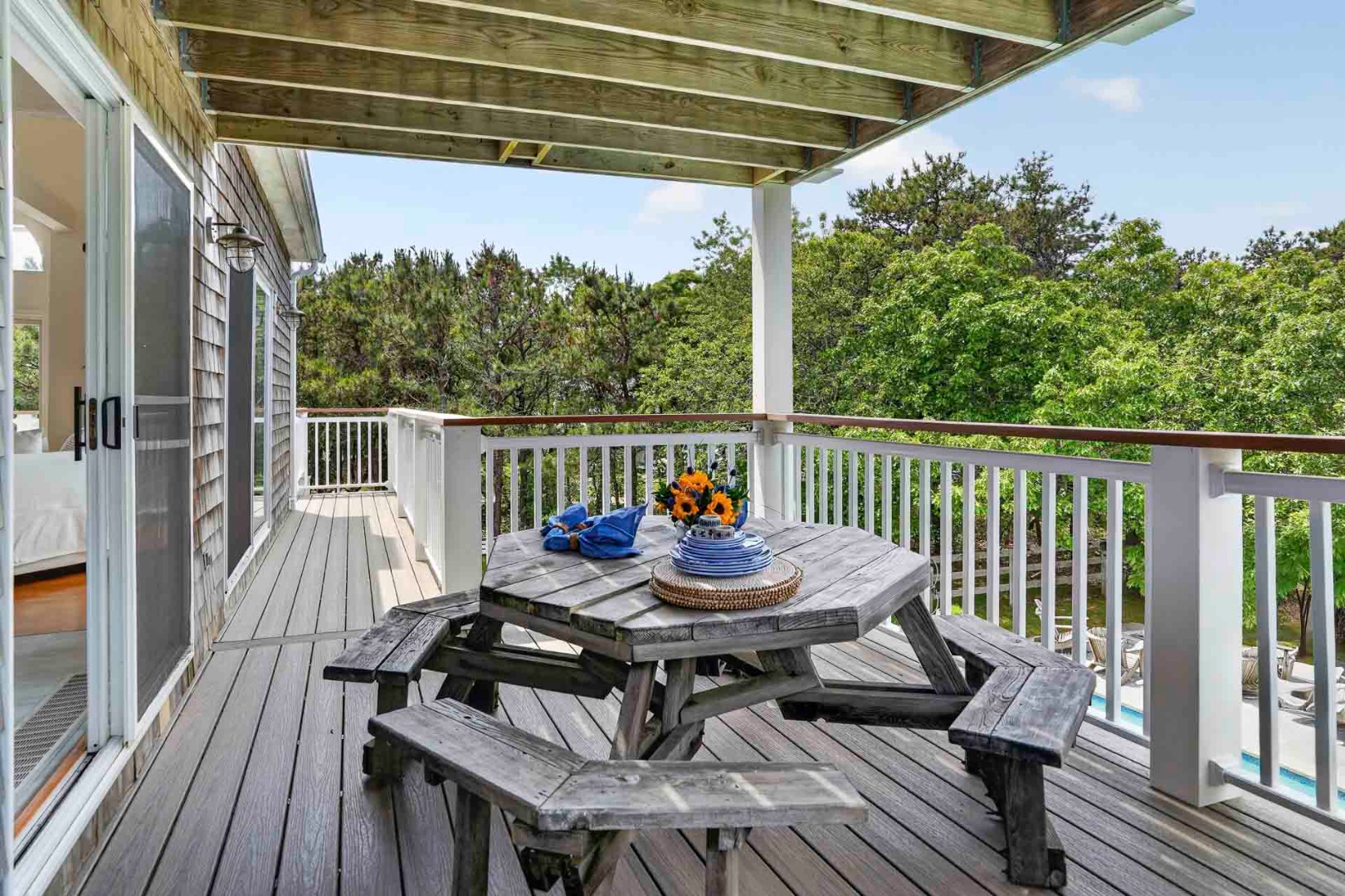 9 Thaxter Lane Edgartown, MA 02539 - Photo 14 of 53 a view of balcony with wooden floor and outdoor seating