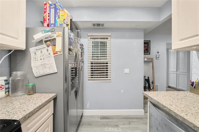 a bedroom with furniture and a couch