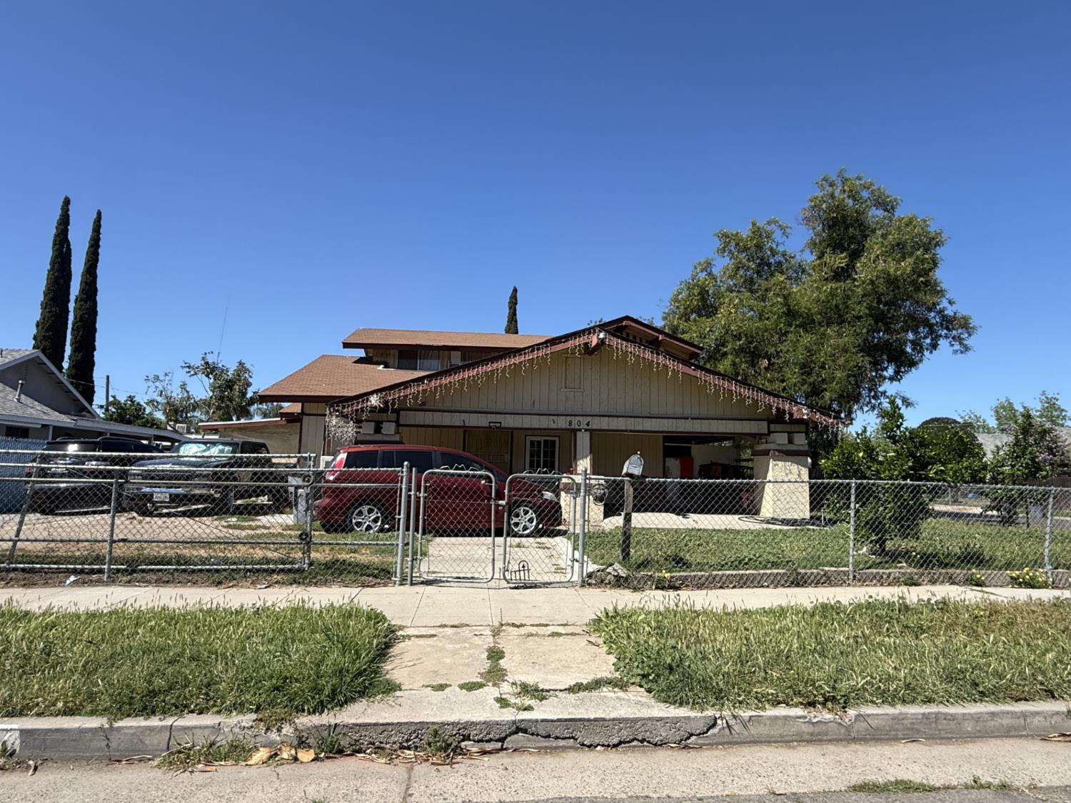 804 South 4th Street Fresno, CA 93702 - Photo 1 of 1 a view of a table and chairs under an umbrella