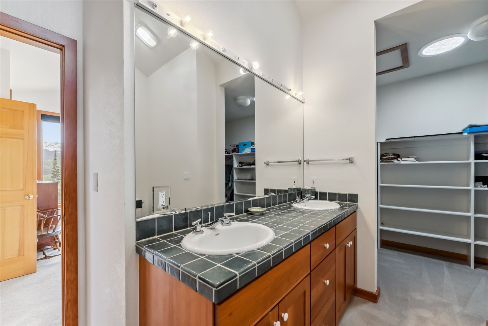 212 Spruce Ridge Road Silverthorne, CO 80498 - Photo 26 of 50 Primary bathroom with walk-in closet
