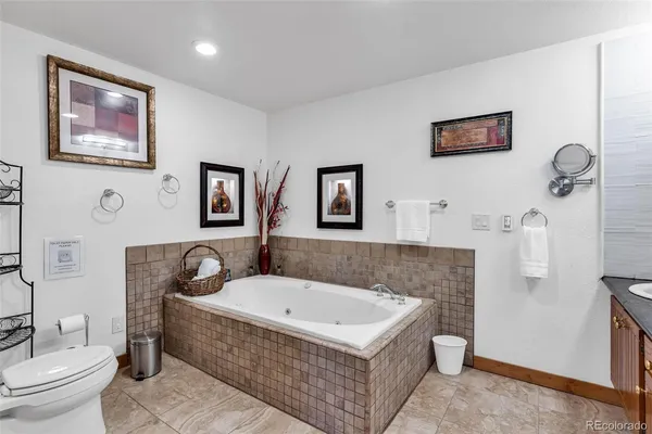 a bathroom with a sink a toilet and a bathtub