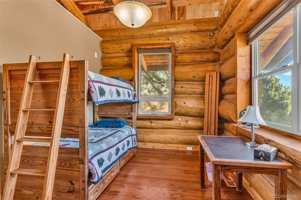 a view of a balcony with furniture and a window