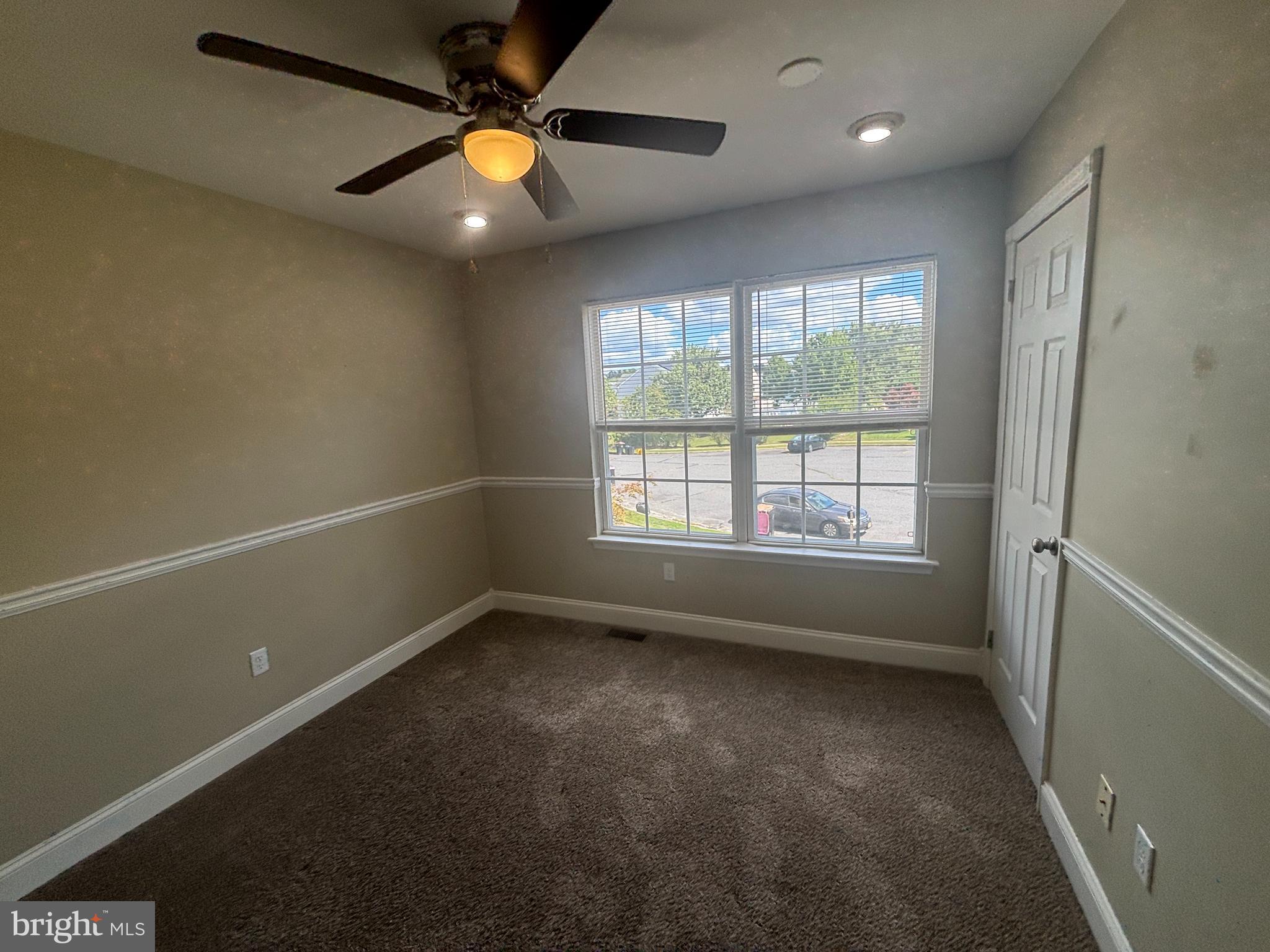 3 Balsley Court Sicklerville, NJ 08081 - Photo 19 of 24 an empty room with windows and fan