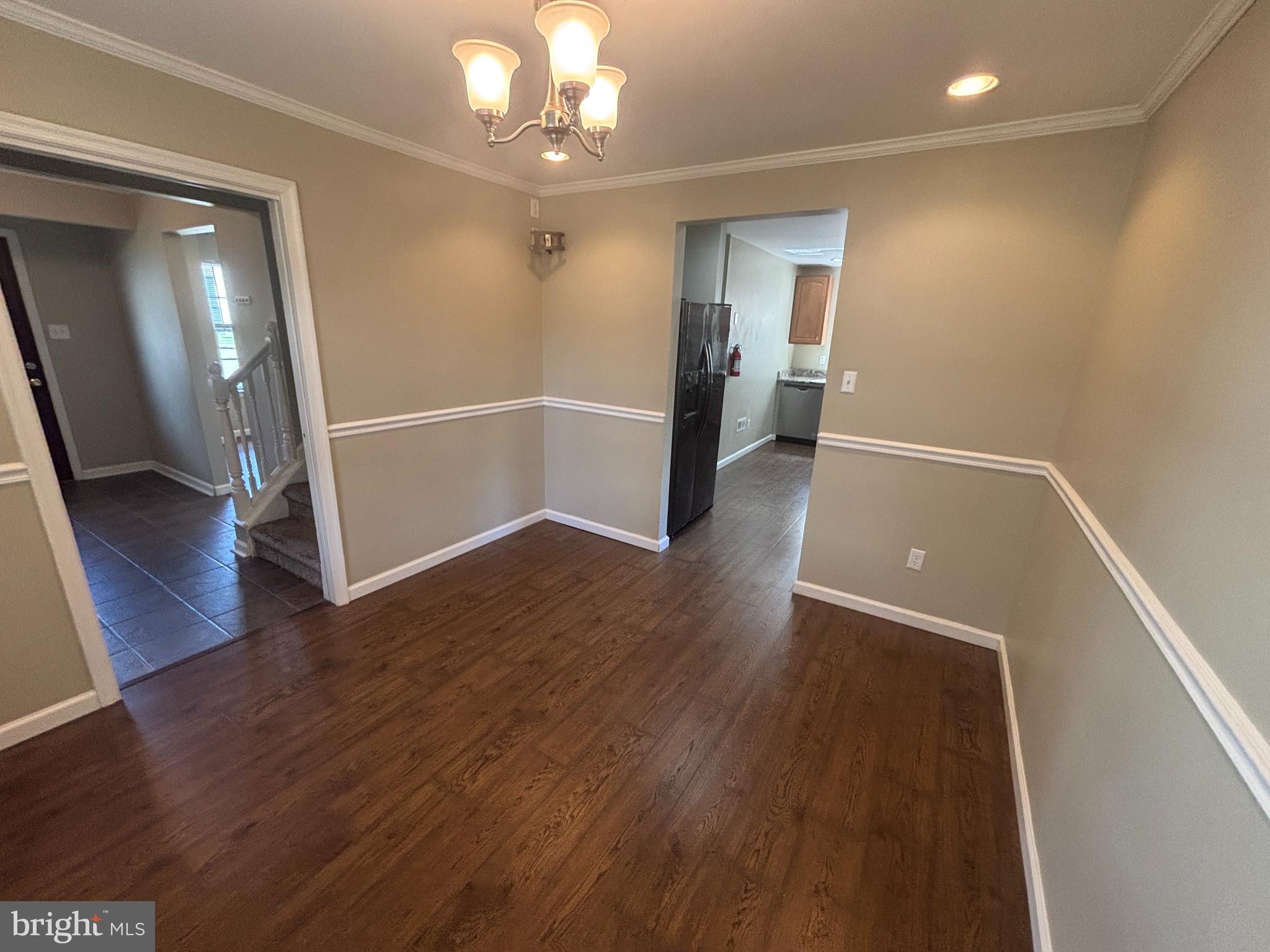 3 Balsley Court Sicklerville, NJ 08081 - Photo 3 of 24 wooden floor in an empty room with a mirror