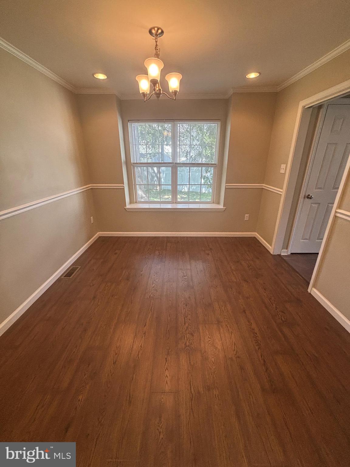3 Balsley Court Sicklerville, NJ 08081 - Photo 7 of 24 an empty room with wooden floor and windows