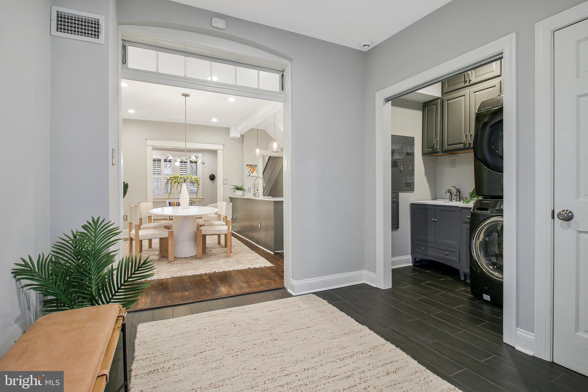 239 11th Street Southeast Washington, DC 20003 - Photo 19 of 53 a living room with furniture and a table