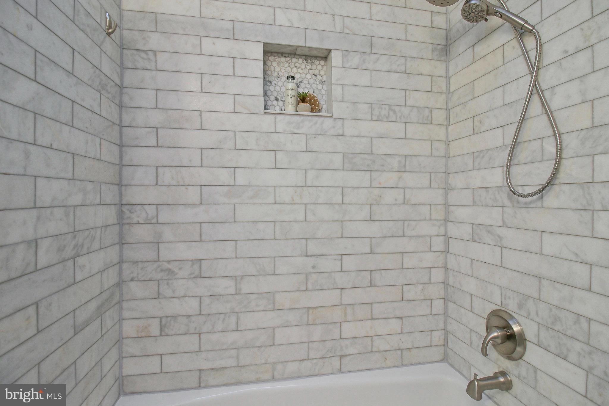 239 11th Street Southeast Washington, DC 20003 - Photo 37 of 53 a bathroom with a shower