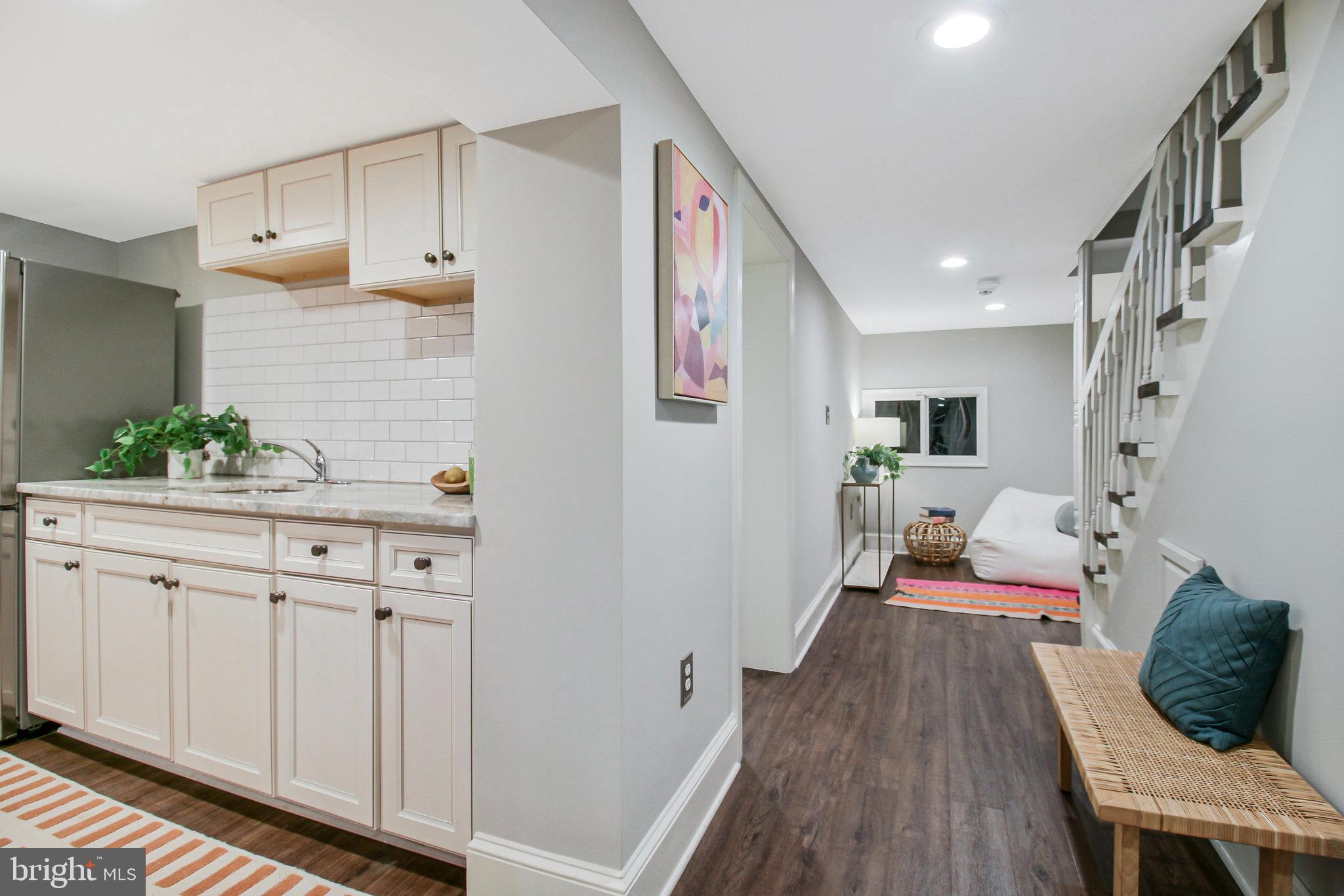 239 11th Street Southeast Washington, DC 20003 - Photo 47 of 53 a living room with furniture