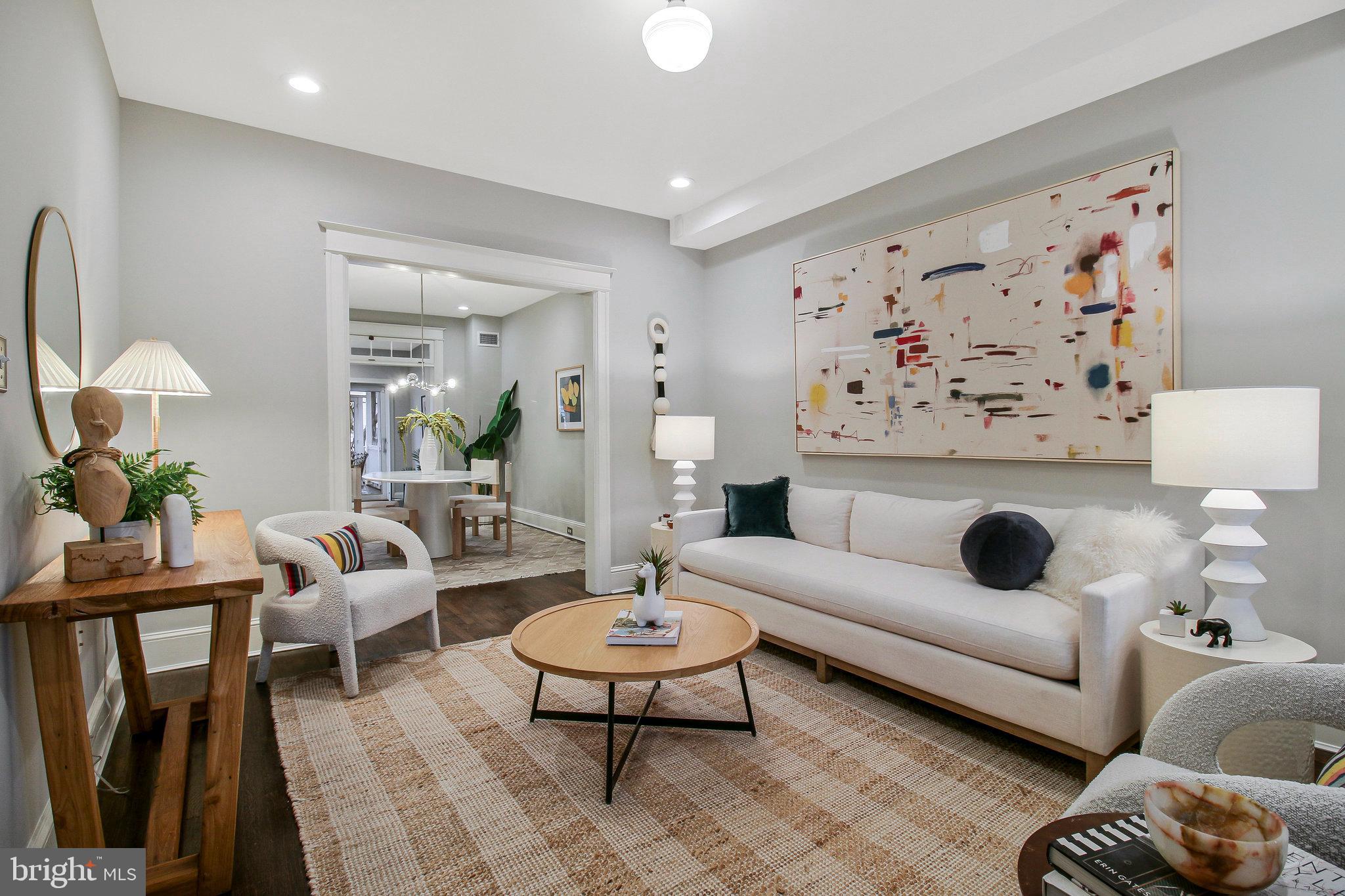 239 11th Street Southeast Washington, DC 20003 - Photo 7 of 53 a living room with furniture and a rug