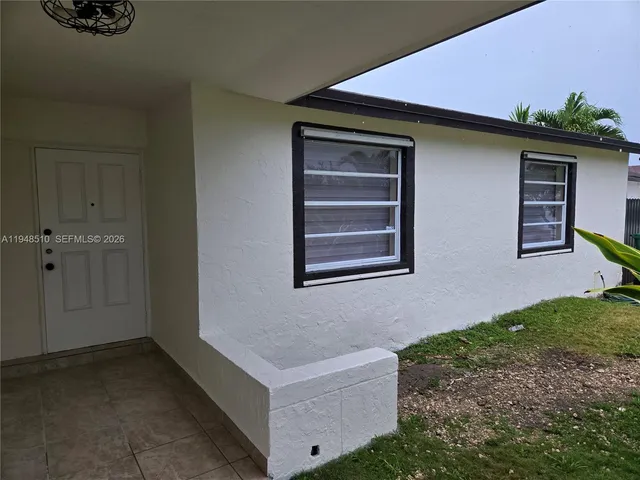 a front view of a house with entryway