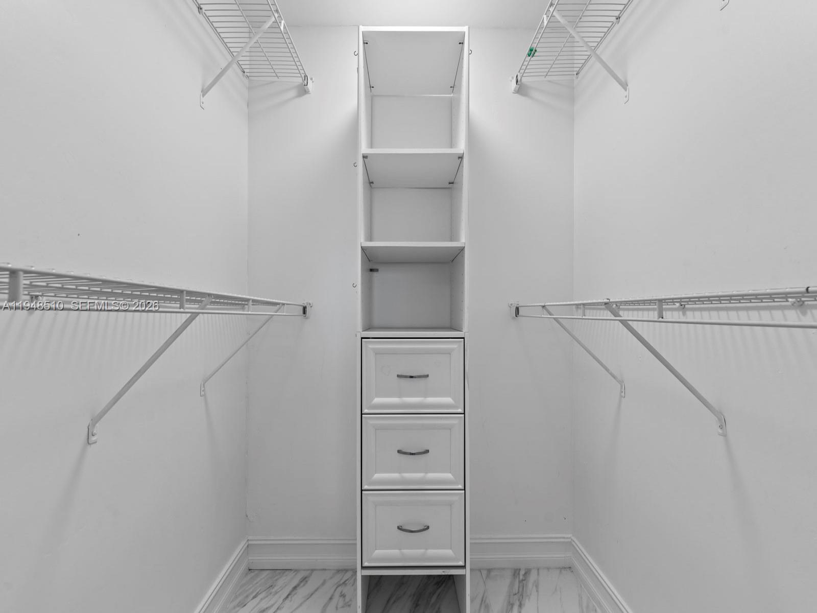 25921 Southwest 130th Avenue Homestead, FL 33032 - Photo 32 of 38 a view of walk in closet