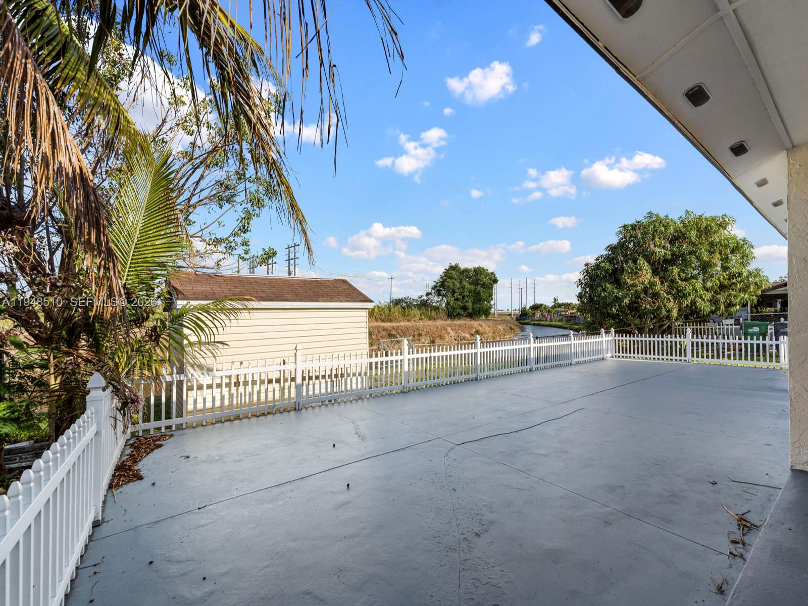 25921 Southwest 130th Avenue Homestead, FL 33032 - Photo 33 of 38 a view of outdoor space and yard
