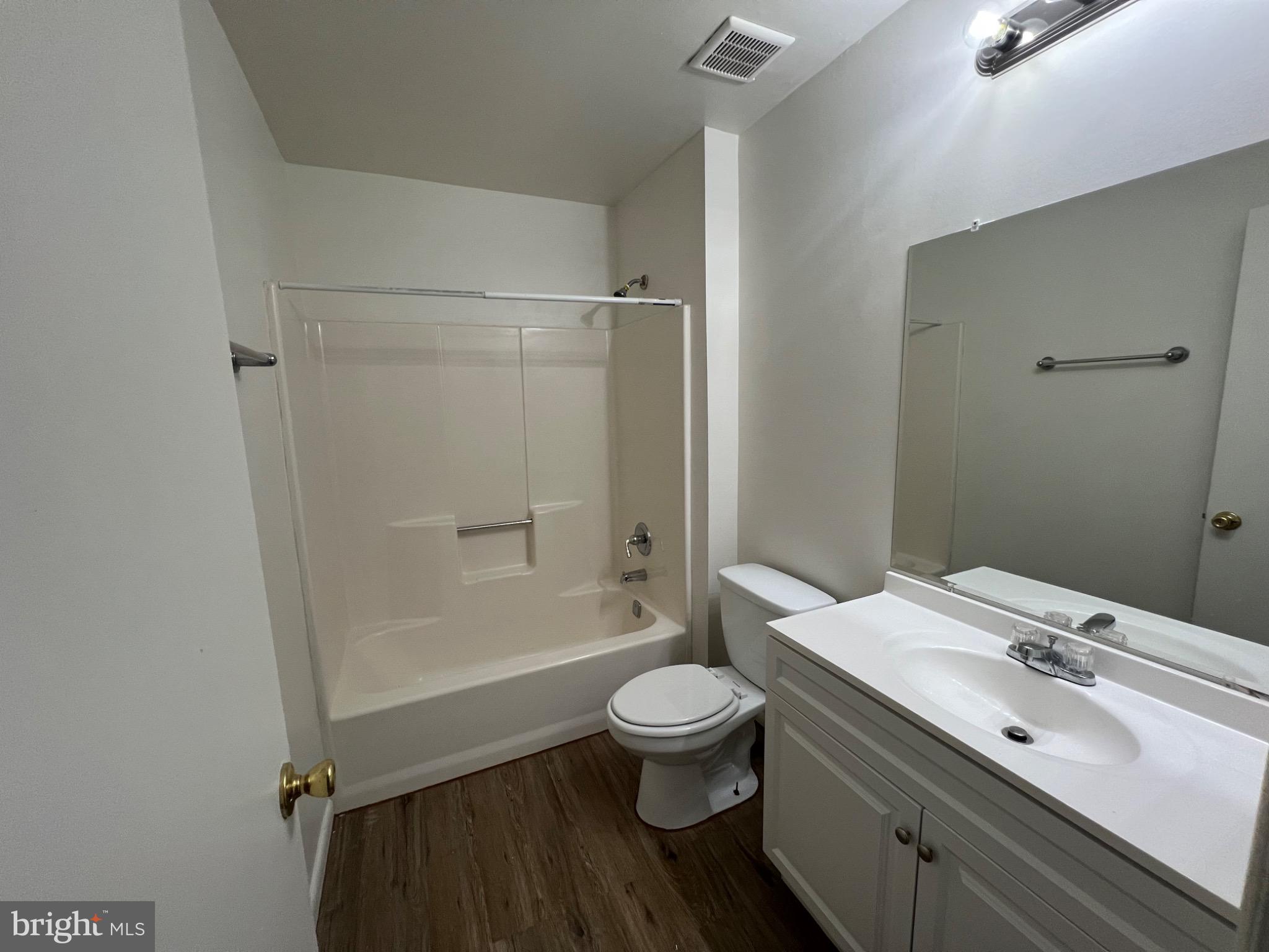 610-402 Noahs Road, Unit 402 Pleasantville, NJ 08232 - Photo 7 of 7 a bathroom with a sink a toilet and shower