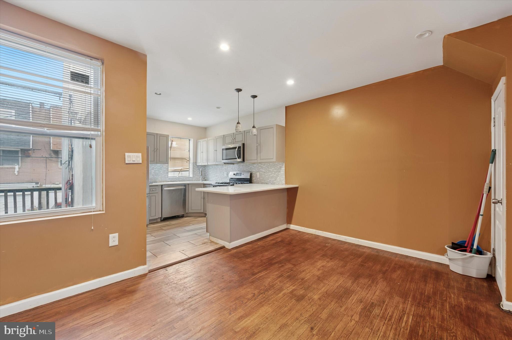 249 West Calvert Street Philadelphia, PA 19120 - Photo 8 of 25 a view of kitchen with wooden floor