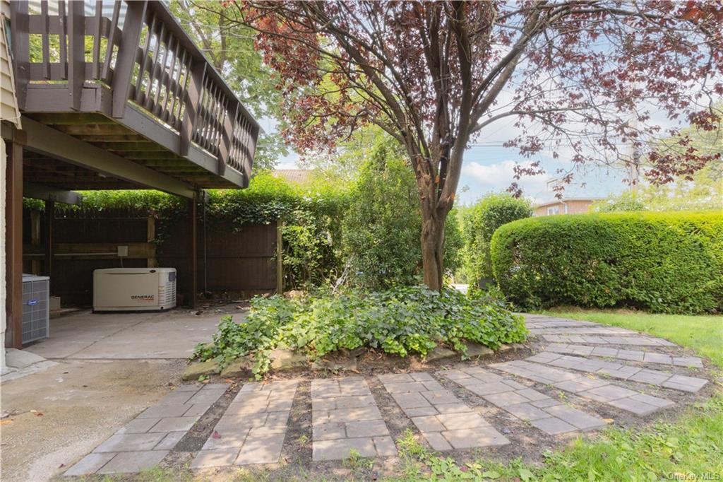 55 East Devonia Avenue, Unit 1 Mount Vernon, NY 10552 - Photo 23 of 24 a view of a backyard with sitting area