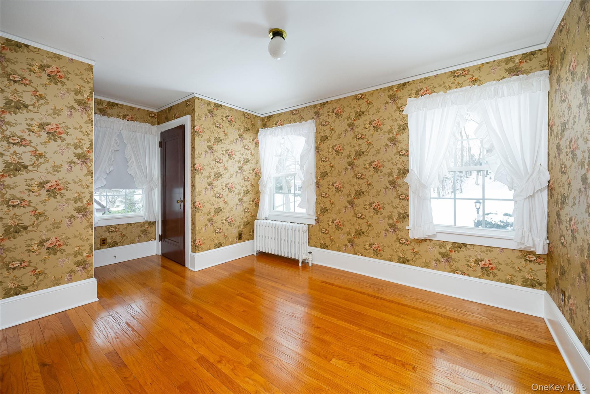 6 Rosalind Road Poughkeepsie, NY 12601 - Photo 19 of 30 a view of an empty room with window and wooden floor