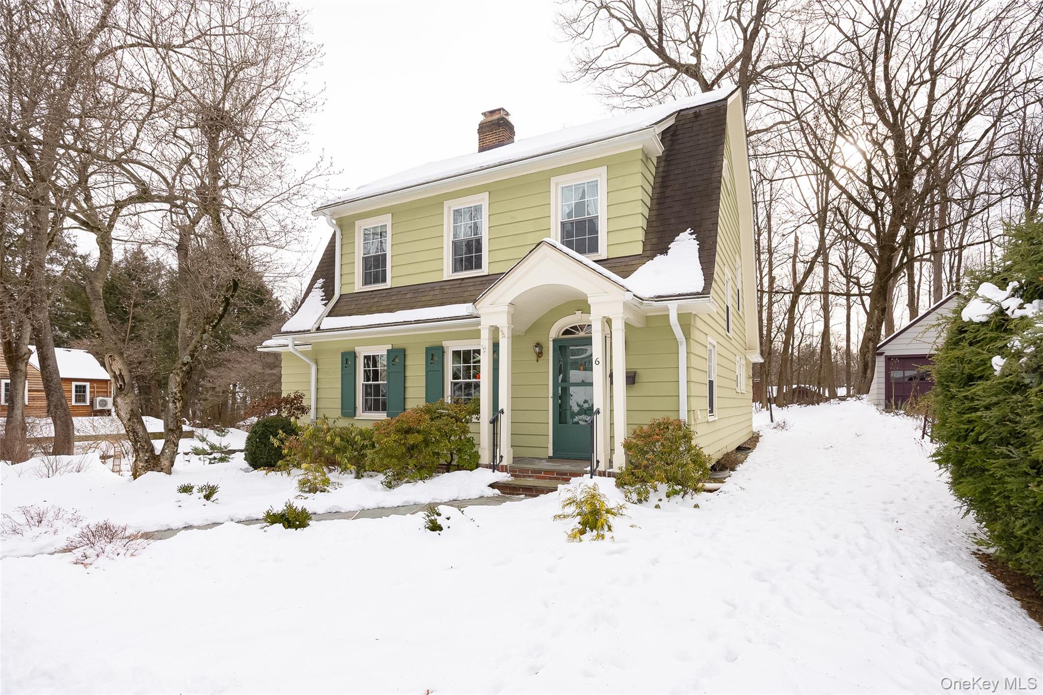 6 Rosalind Road Poughkeepsie, NY 12601 - Photo 2 of 30 a front view of a house with a yard covered in snow