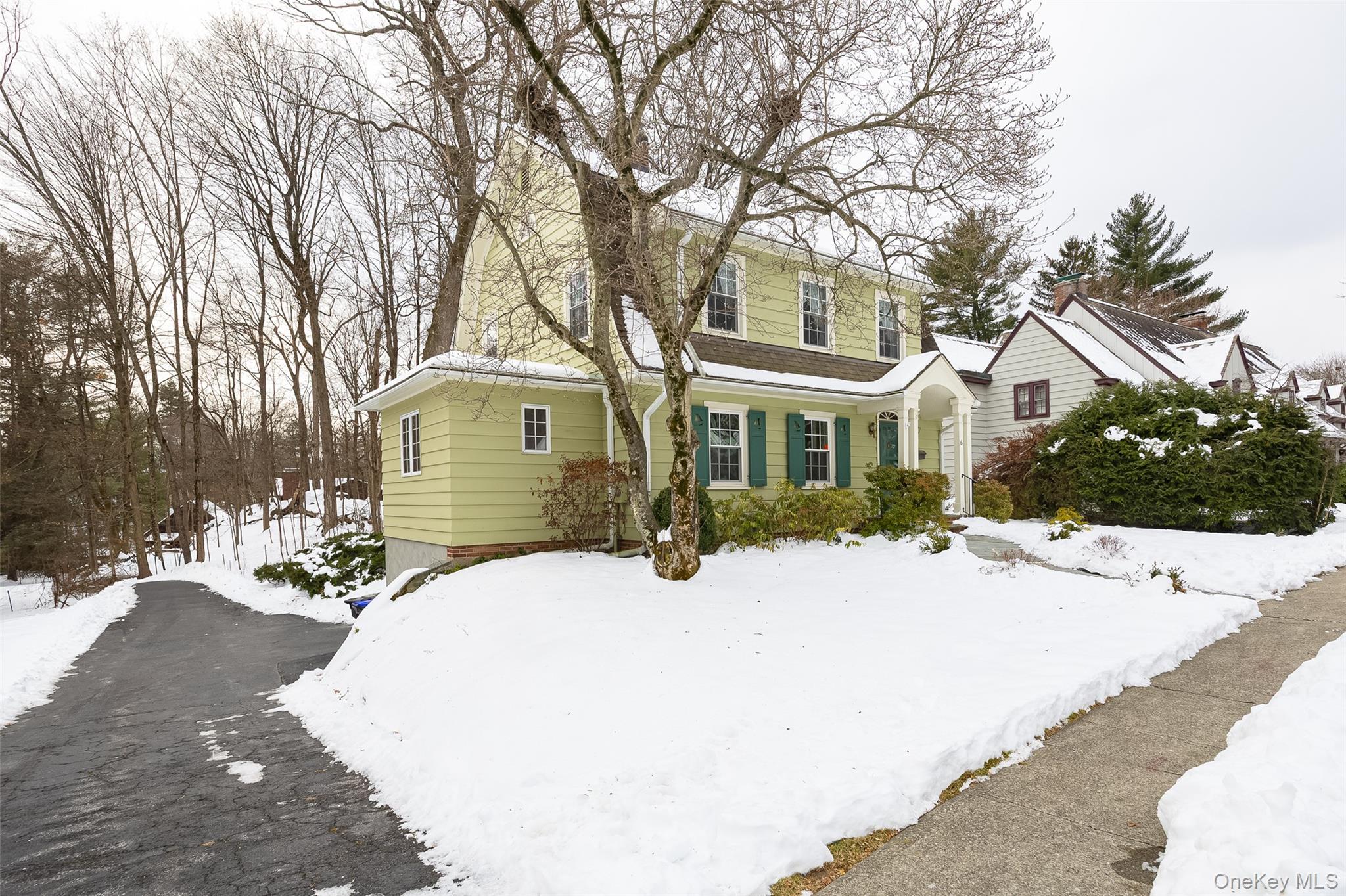 6 Rosalind Road Poughkeepsie, NY 12601 - Photo 30 of 30 a front view of a house with a yard covered in snow