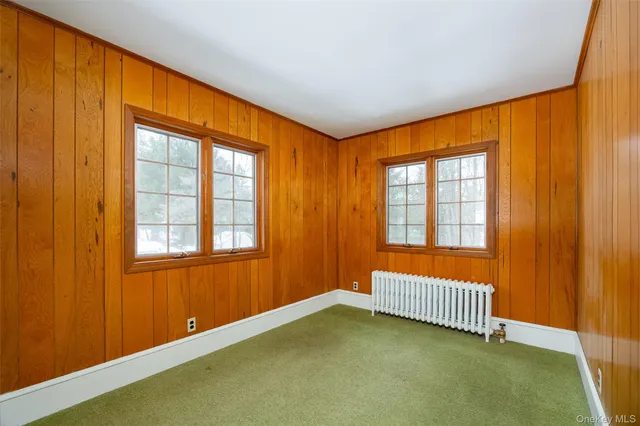 a view of a room with a large window