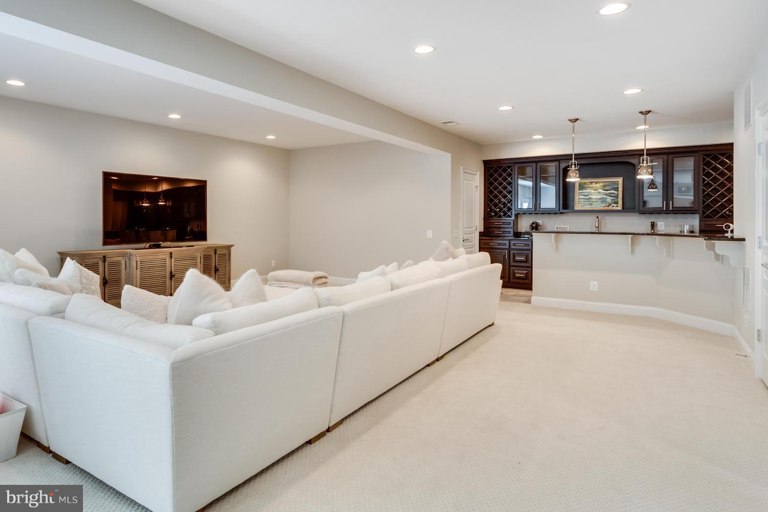 10201 Browns Mill Road Vienna, VA 22182 - Photo 24 of 30 Living Room Lower Level with Bar