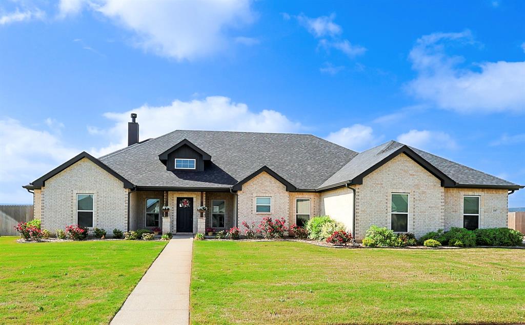 107 Kleingrass Road Abilene, TX 79606 - Photo 2 of 39 a front view of a house with a yard