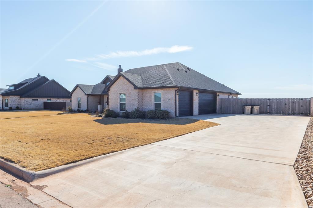 107 Kleingrass Road Abilene, TX 79606 - Photo 38 of 39 Brick exterior with dark shingle roofing